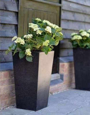 Chậu xi măng đá mài – Giải pháp cảnh quan đô thị thông minh